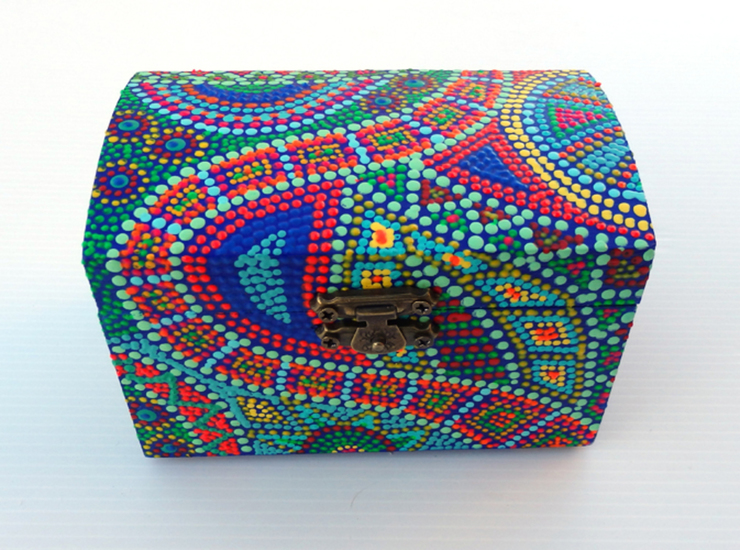 wooden box with colourful dots