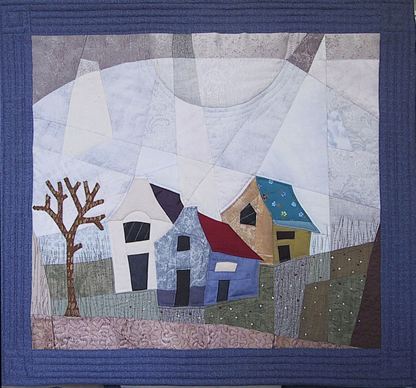 Drie huizen met boom