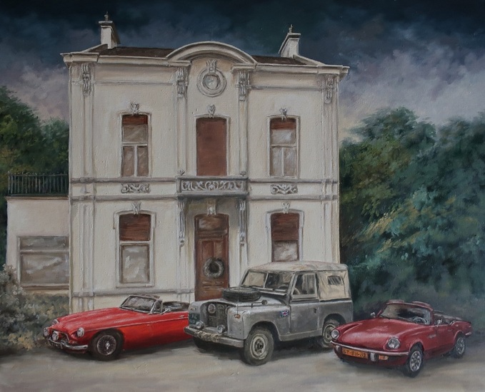 Huis met sportwagens