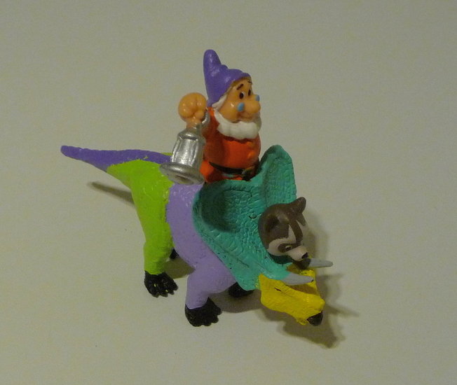 Docandhispetraccoononthebackofatriceratops-Saurus