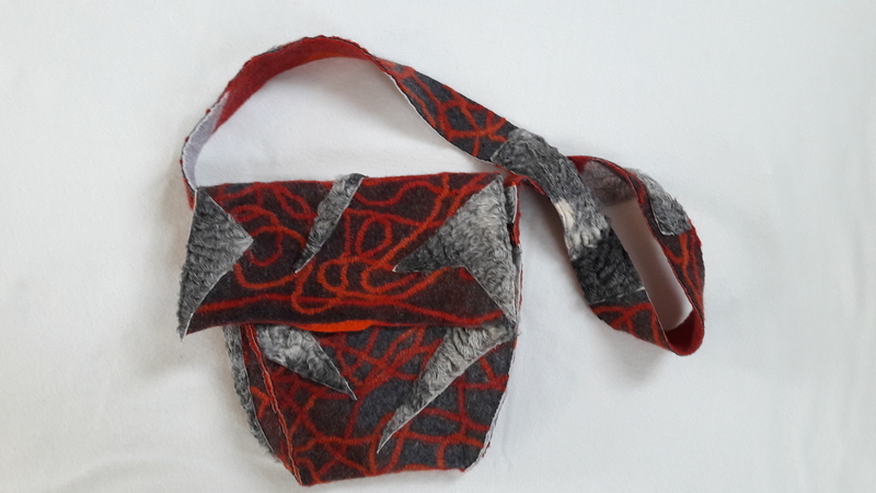 gevilte tas met leer