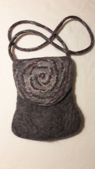 gevilte tas met wol en zilverdraad