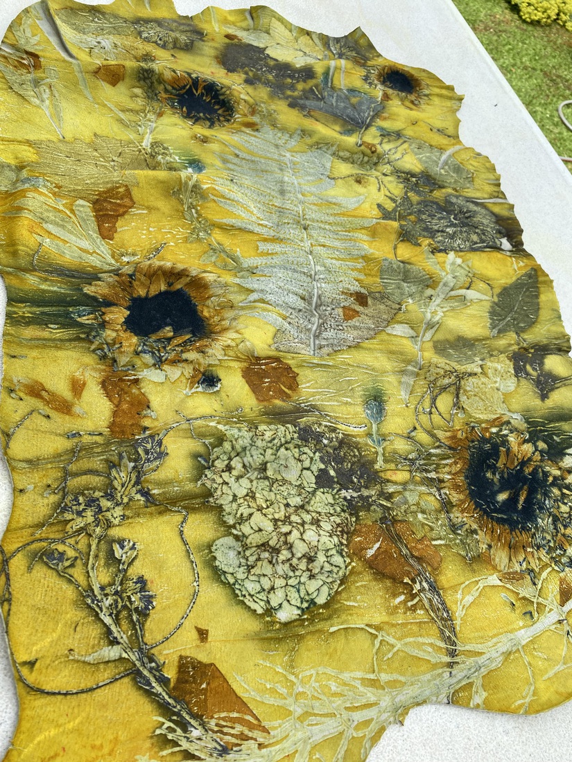 Geitenleer met zonnebloemen