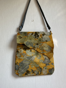 Ik heb op geitenleer geprint en er tassen van gemaakt. 