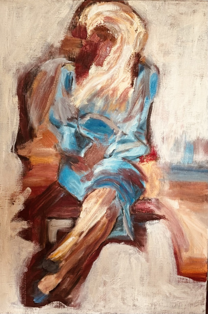 Zittende vrouw in turquoise