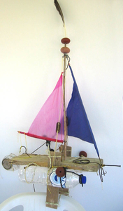 model sailing boats made of scrap I found on beaches across the globe.