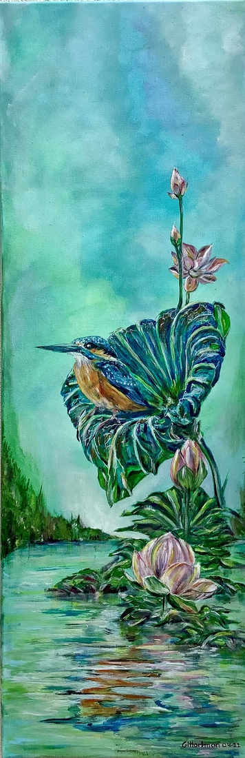 IJsvogeltje op een lotusblad