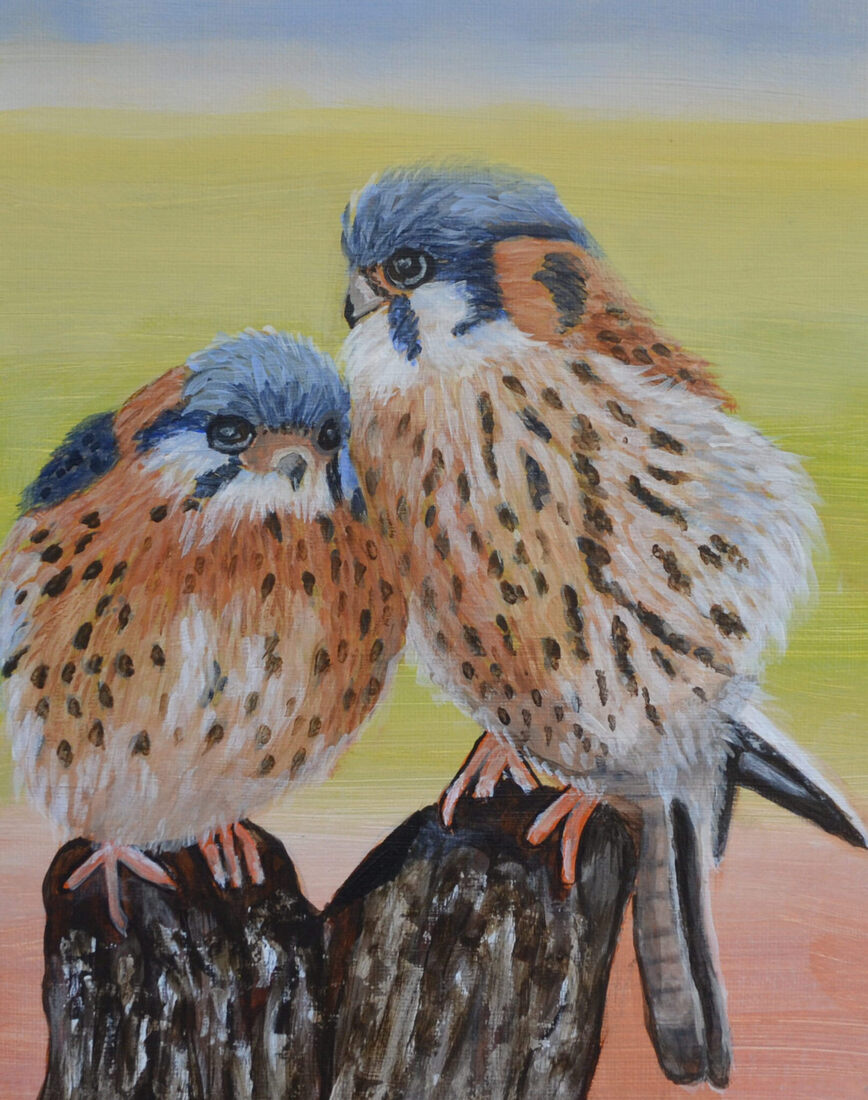 Twee vogels op boomstam