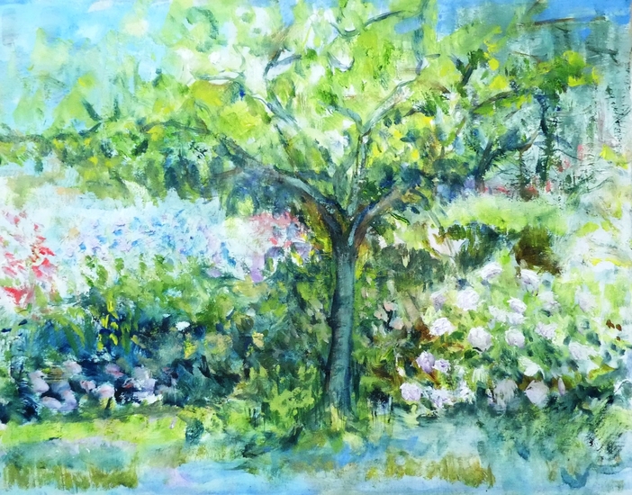 Tree in garden with flowers