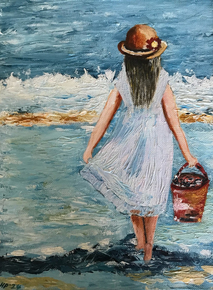 Meisje aan zee/ strand met emmertje