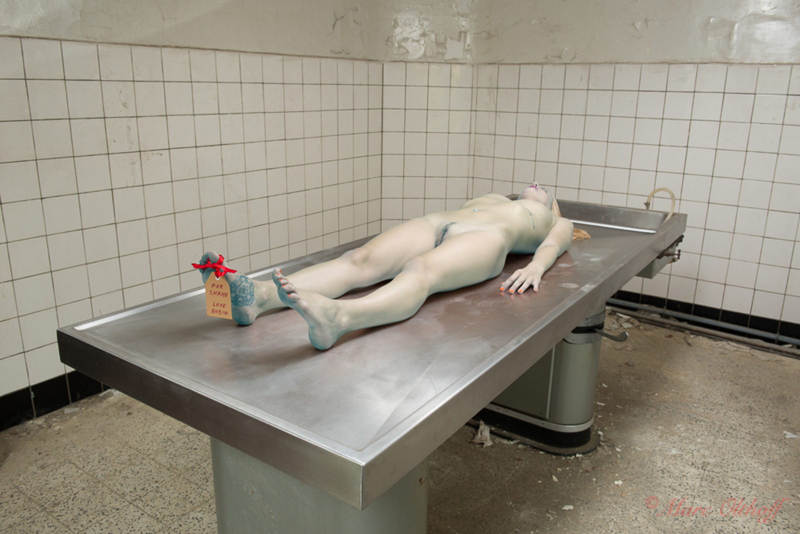 Naked morgue scenes