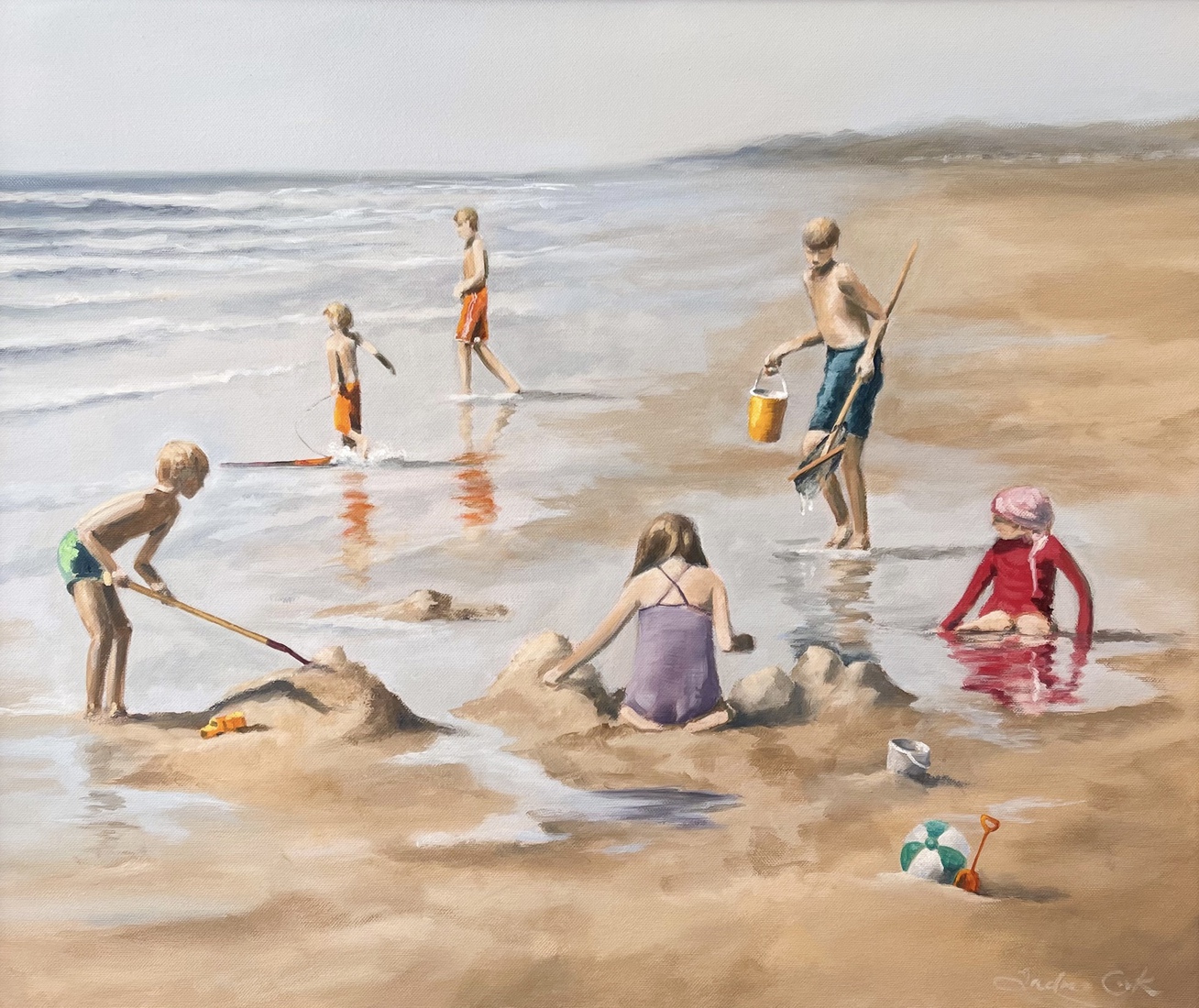 Spelende kinderen aan het strand