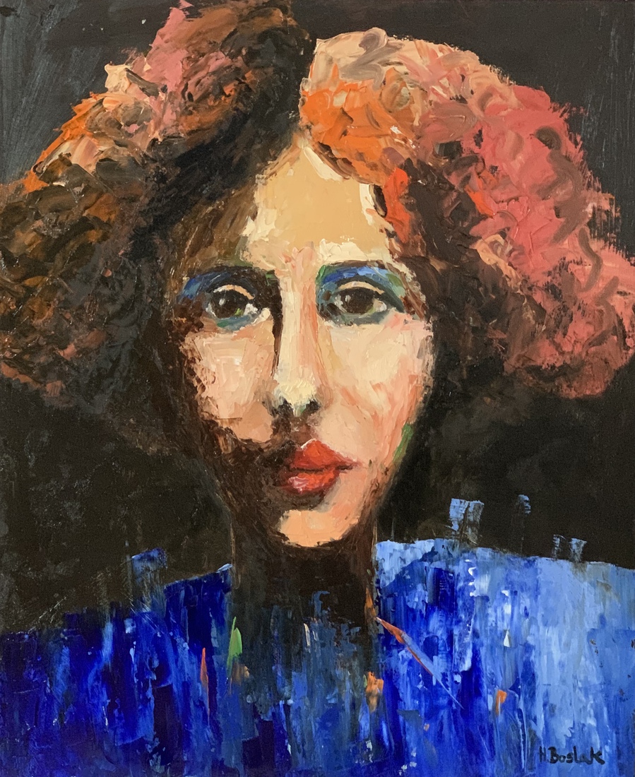 Een dame met rood haar.