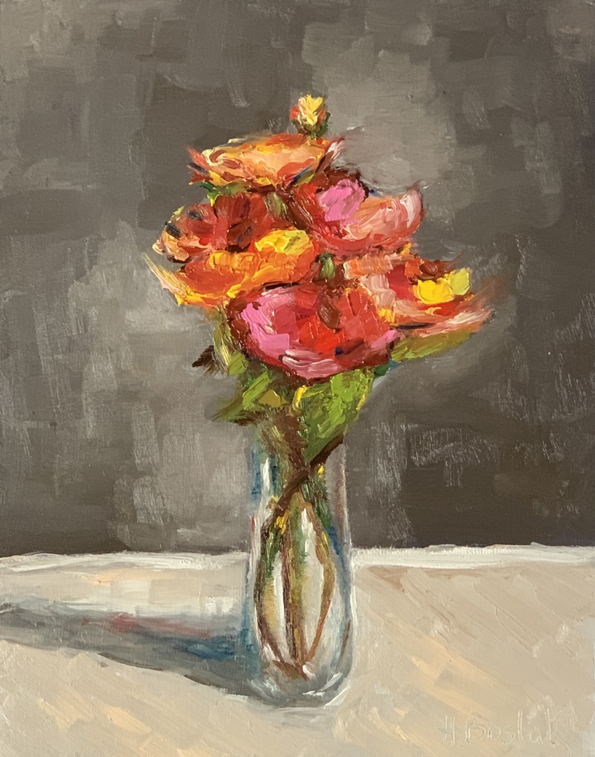 Ranonkels in een glazen vaasje