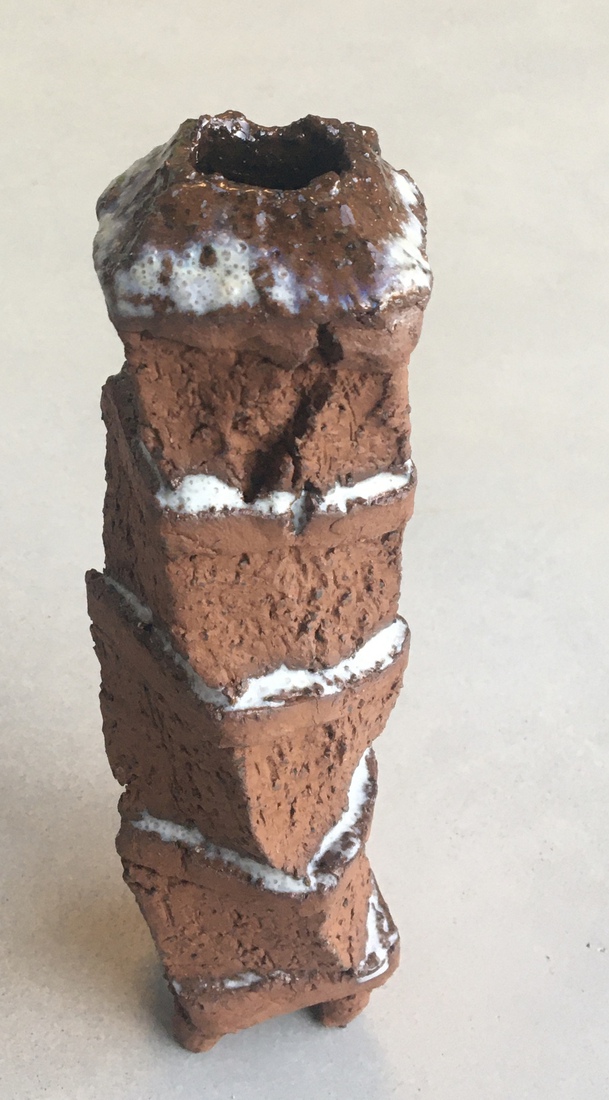 Twisted, unicum, donkerrode speciale klei