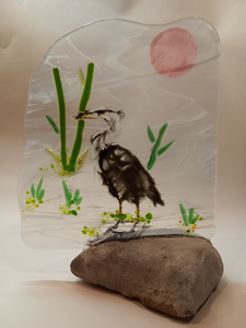 Birds and animals represented in different forms of glass art.