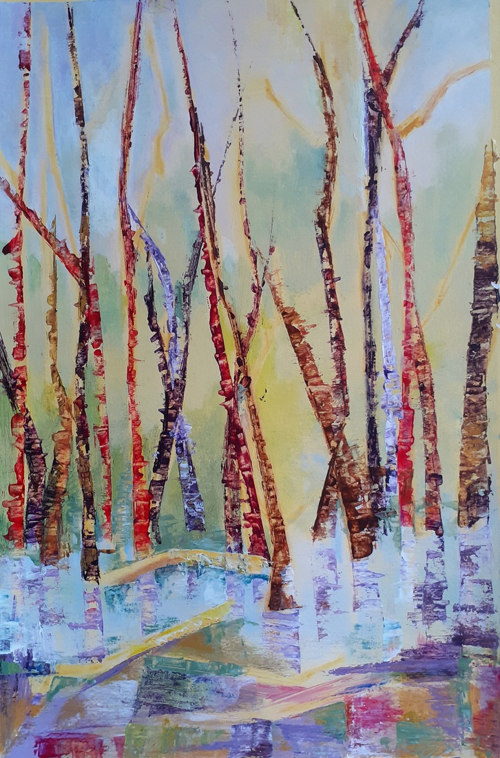 Gekleurde stammetjes in het water