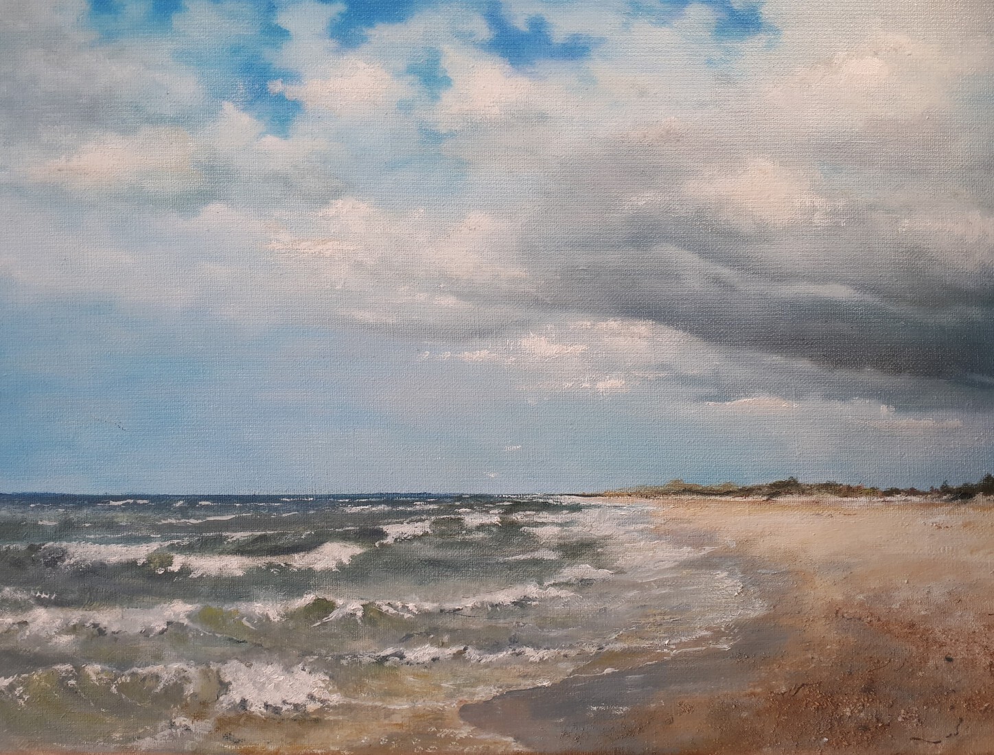 Regenbui boven het strand.  