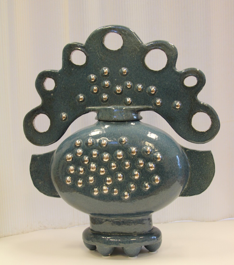 Maan, verbonden met beeld Zon.