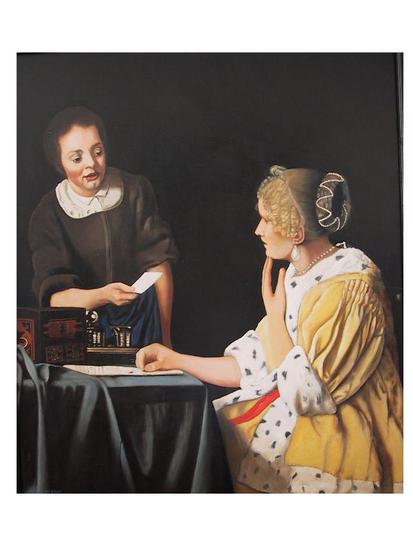 Vrouw en dienstbode met brief