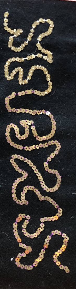 Pailettenverwerking in rand