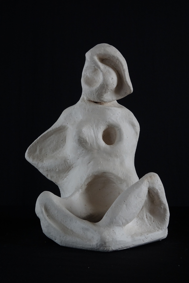 Figuur zittend in lotus