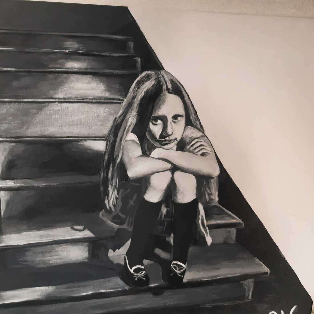 Bedroefd meisje op trap